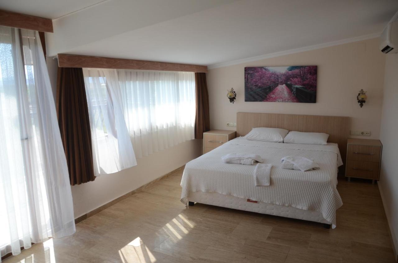 Oasis Apart Hotel Дальян Экстерьер фото